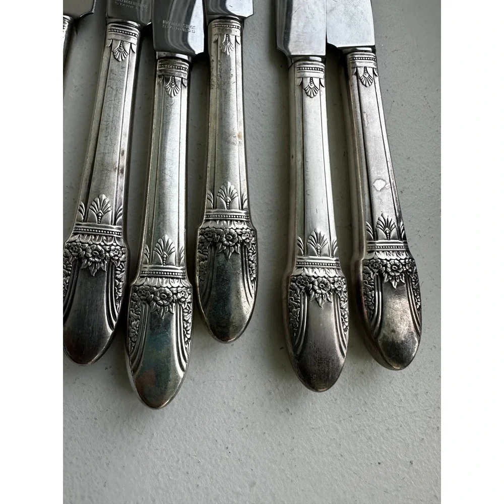 1937 Roger's Co. set of 8 First Love pattern stainless butter knives